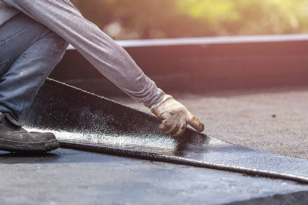 Professional Basement Waterproofing technician working in Greenville, IN